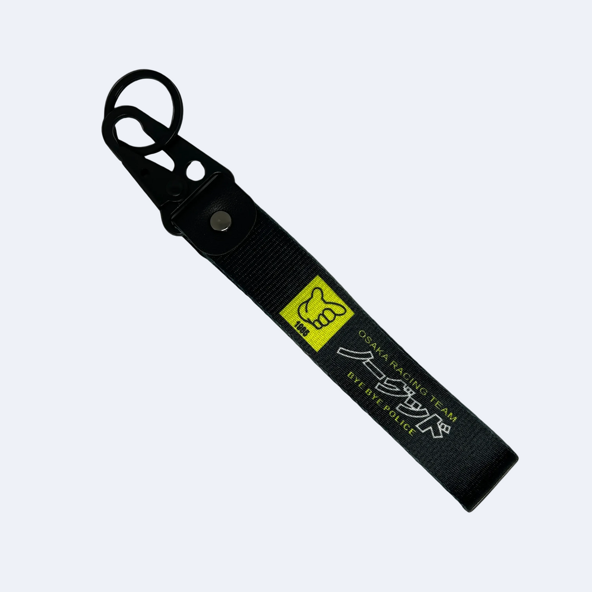 Motorev Osaka Racing Team car key tag, a zinc alloy and nylon JDM keyring featuring a bold street racing crew design, scratch resistant and built for JDM and car culture enthusiasts UK