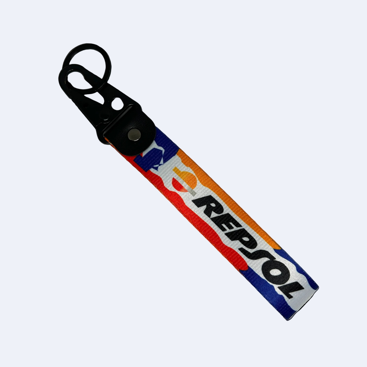 Motorev Repsol car key tag, a zinc alloy and nylon keyring featuring the iconic Repsol motorsport livery design, scratch resistant and built for motorsport and racing enthusiasts UK