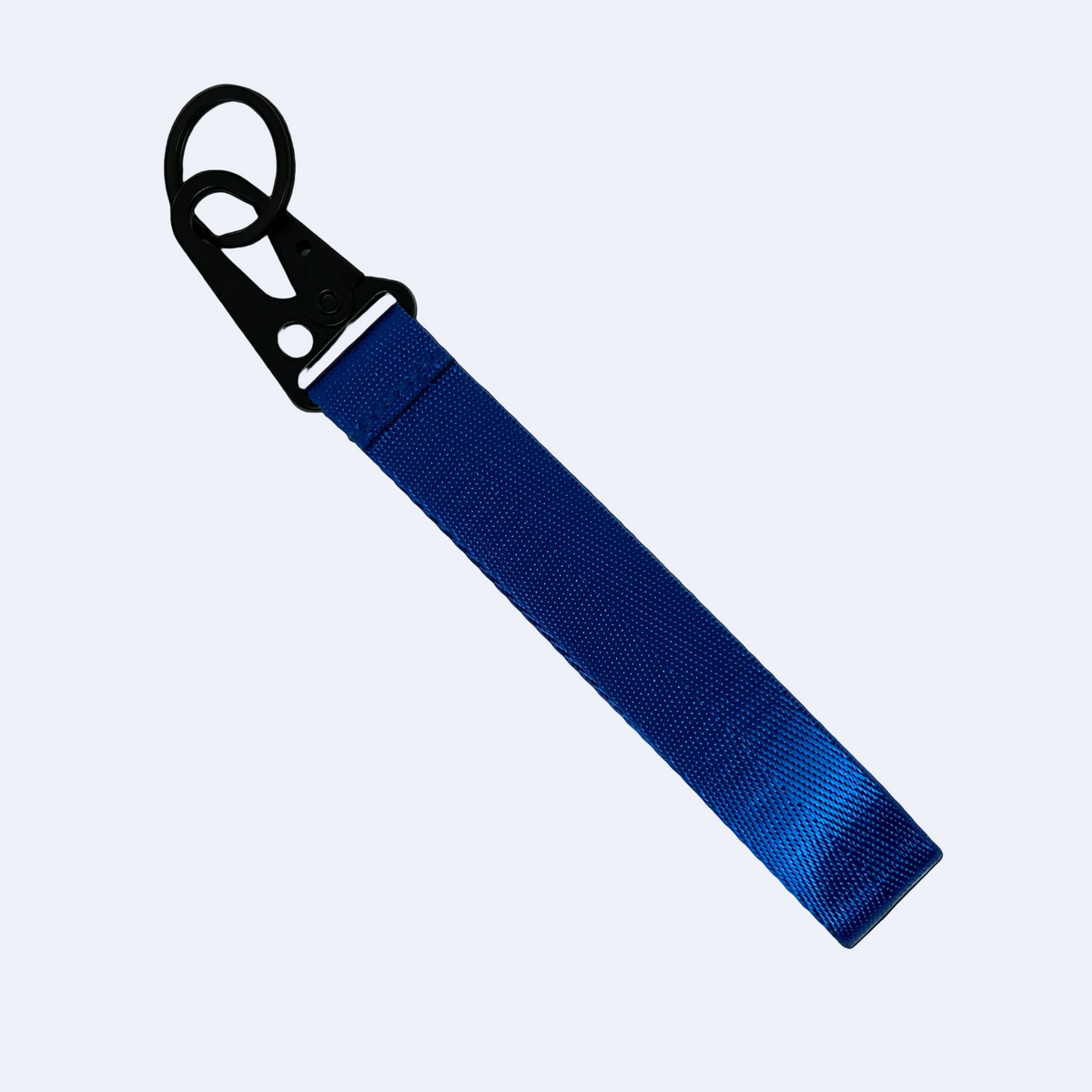 Blue Supreme style key tag with bold logo text – Motorev JDM car keychain accessory