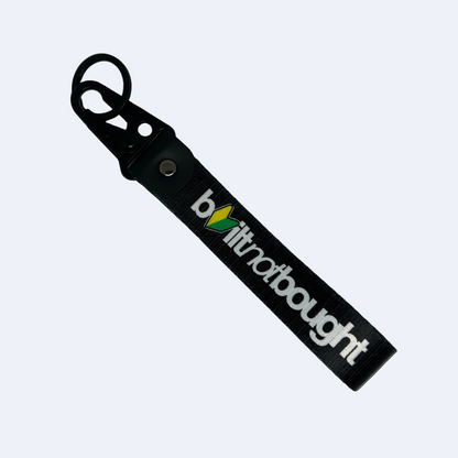 Black Built Not Bought key tag with JDM logo design – Motorev car keychain accessory