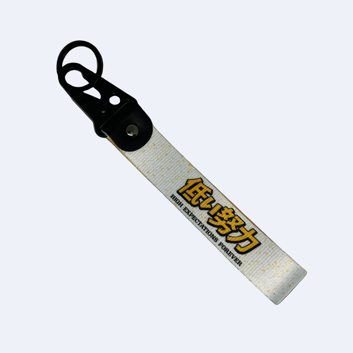 Motorev High Expectations Forever car key tag, a zinc alloy and nylon JDM keyring featuring a bold motivational design, scratch resistant and built for JDM and car culture enthusiasts UK