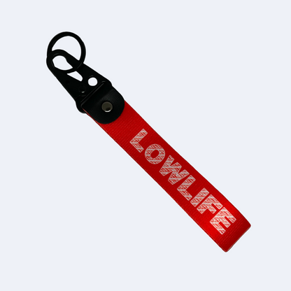 Red LOWLIFE key tag with bold street-style text – Motorev JDM car keychain accessory