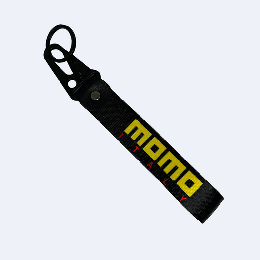 Black key tag with MOMO branding in yellow – Motorev JDM car accessory