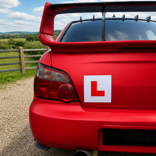 L plates displayed on a Subaru with magnetic backing – Motorev learner driver car accessory