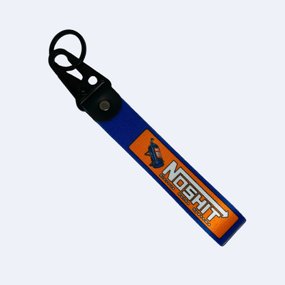 Blue and orange NOSH*T key tag with NOS bottle design – Motorev JDM car keychain accessory