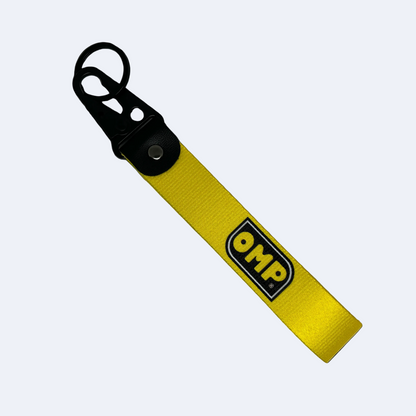Yellow OMP key tag with racing branding – Motorev car keychain accessory