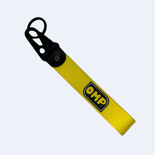 Yellow OMP key tag with racing branding – Motorev car keychain accessory