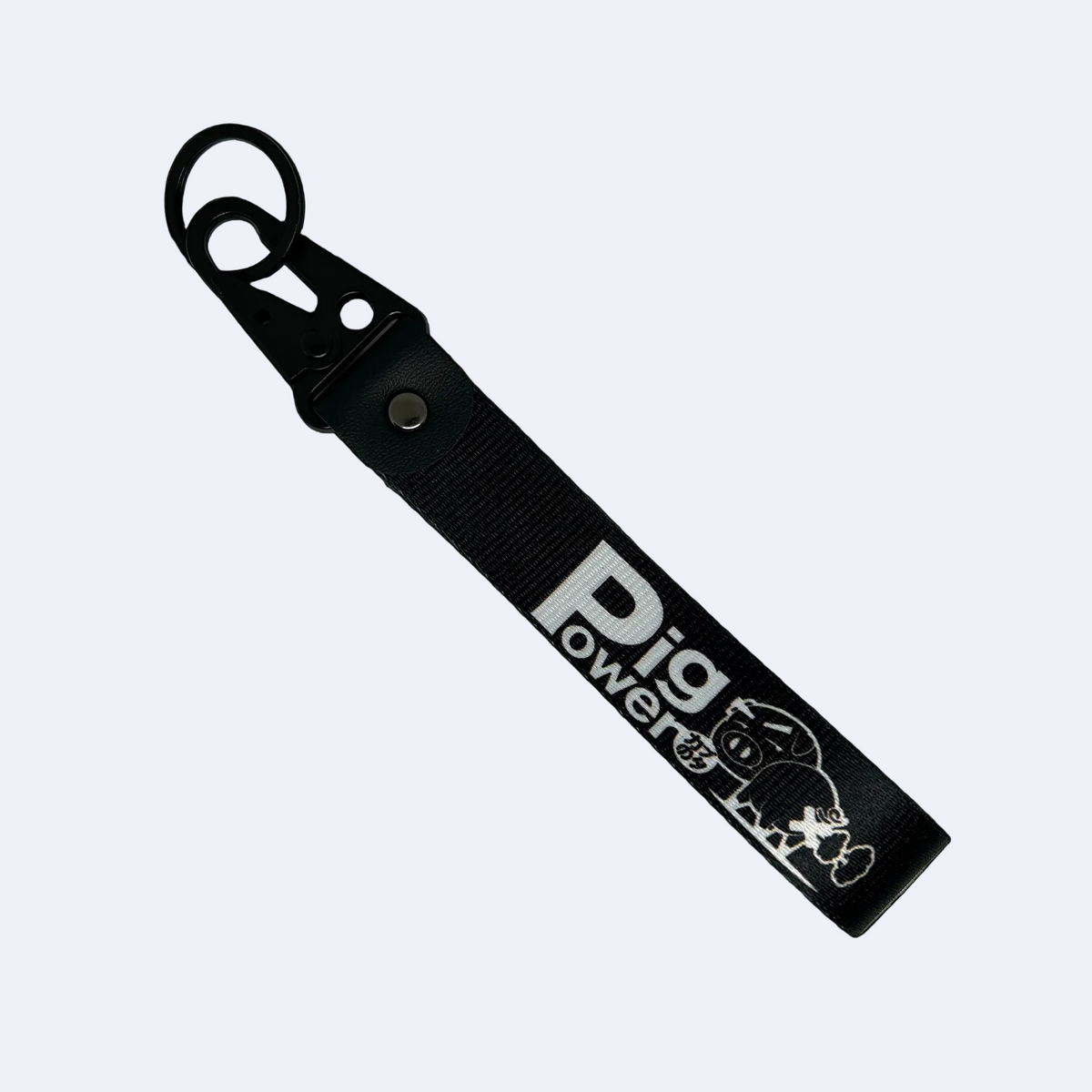 Back side of black JDM key tag with Pig Power branding – MotoRev automotive keychain accessory