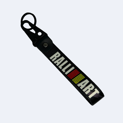 Black key tag with RALLIART branding – Motorev performance keychain for car enthusiasts