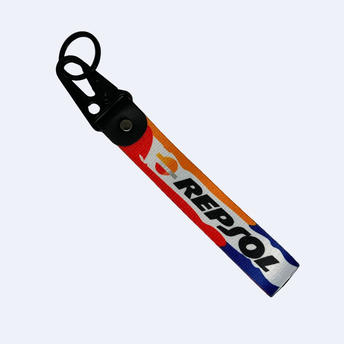 Motorev Repsol car key tag, a zinc alloy and nylon keyring featuring the iconic Repsol motorsport livery design, scratch resistant and built for motorsport and racing enthusiasts UK
