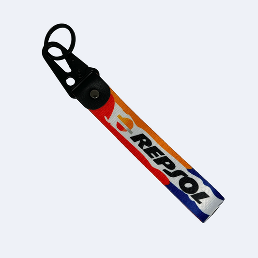 Motorev Repsol car key tag, a zinc alloy and nylon keyring featuring the iconic Repsol motorsport livery design, scratch resistant and built for motorsport and racing enthusiasts UK
