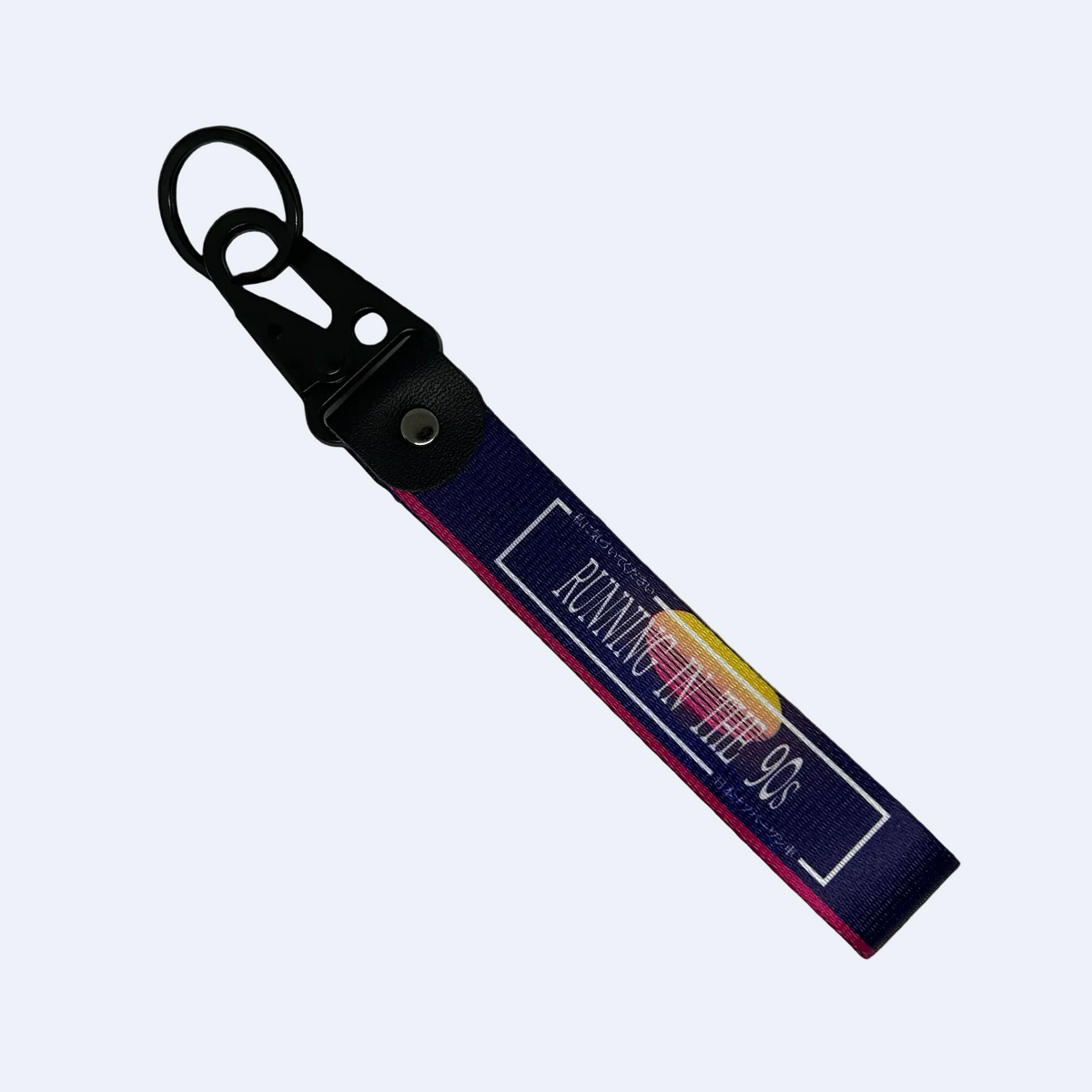 Purple key tag with a 90's sunset aesthetic and text that reads "Running In The 90's" – Motorev performance car keychain