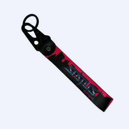 Motorev STATUS ERROR City Skyline car key tag, a zinc alloy and nylon keyring featuring a striking urban city skyline graphic design, scratch resistant and built for car culture and street style enthusiasts UK