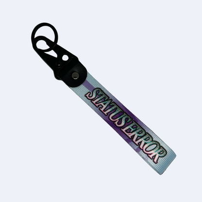 Motorev STATUS ERROR Gradient Bloom car key tag, a blue and purple gradient wrist strap keyring featuring bold STATUS ERROR typography, built for car culture and street style enthusiasts UK