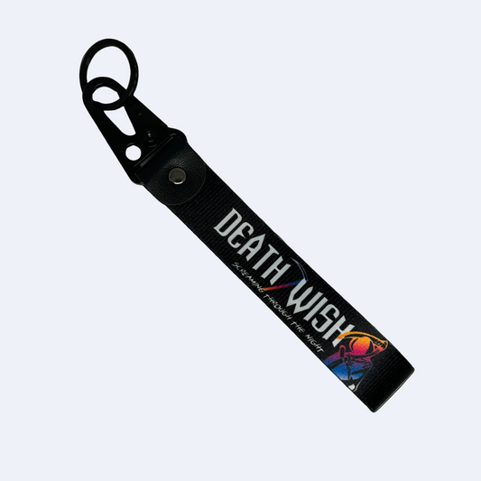 Motorev Screaming Through The Night car key tag, a zinc alloy and nylon keyring featuring a bold night driving-inspired design, scratch resistant and built for car culture and motorsport enthusiasts UK