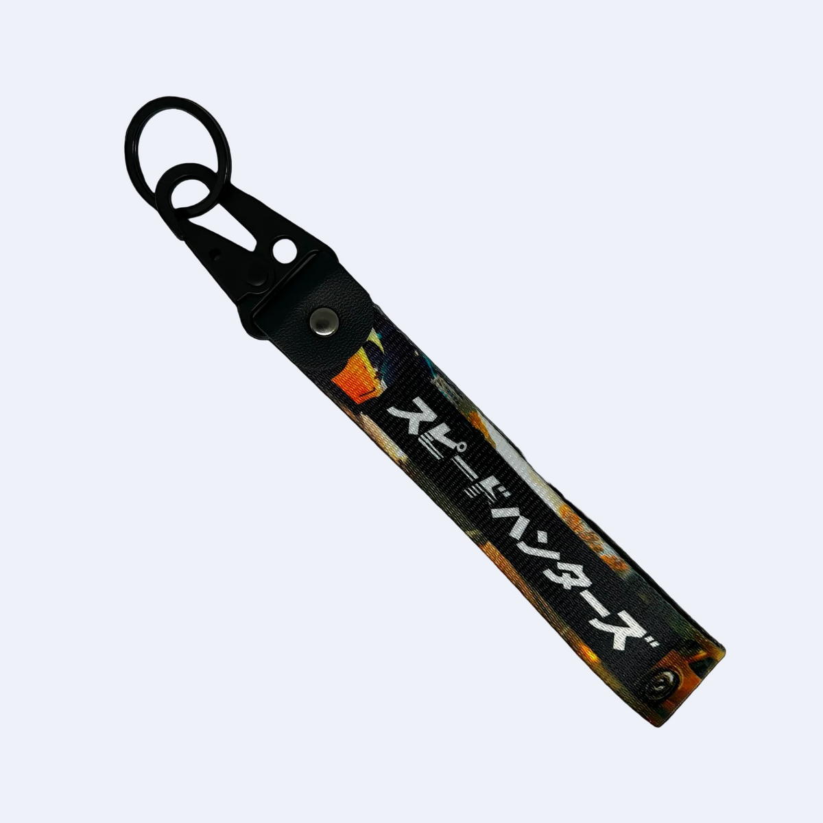 Key tag with a background image of a car scene and Japanese text reading "Speedhunters" – Motorev performance car keychain