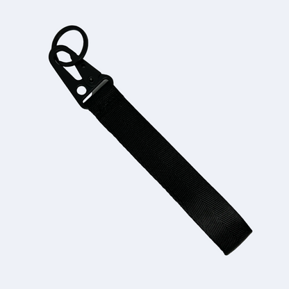 Motorev Subaru STI embroidered car key tag, a wrist strap keyring featuring the iconic STI logo stitched in detail, built for Subaru and JDM enthusiasts UK