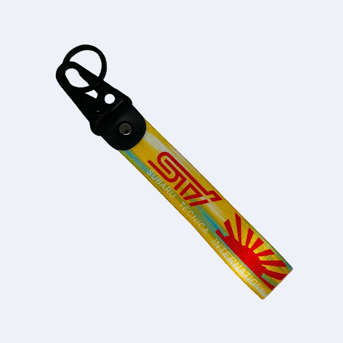 Yellow key tag with the Subaru WRX STI logo and Japanese rising sun – Motorev automotive keychain