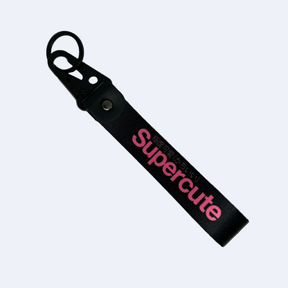 Black Supercute key tag with pink text – Motorev girly JDM car keychain accessory